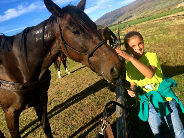 Schuyler thanks her horse, Boss, for a great ride