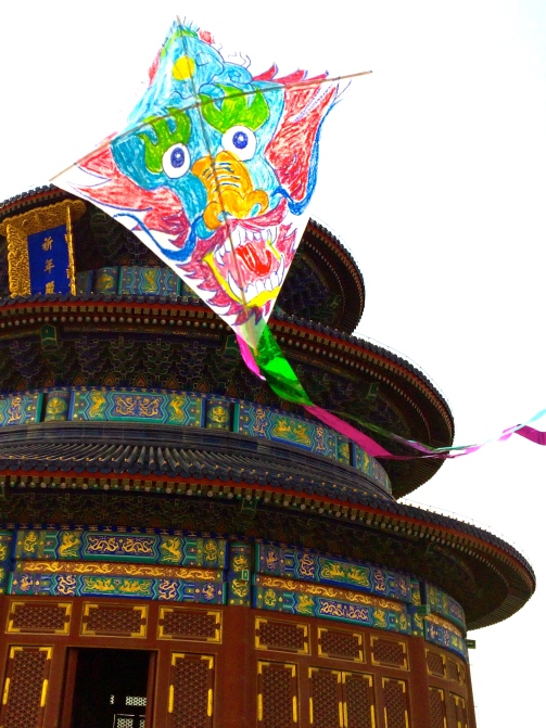 Jeff's dragon kite soars in front of Lanna Temple
